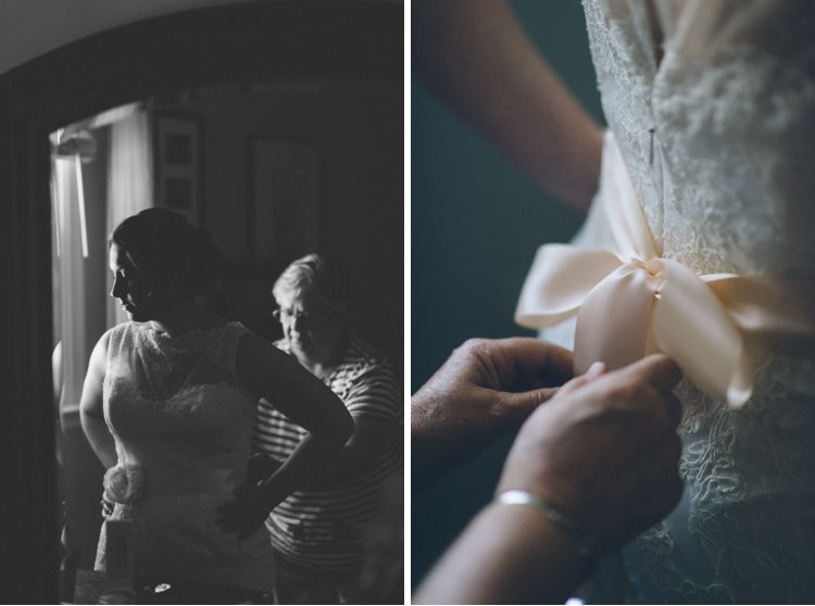 Bride gets into her dress on the morning of her wedding day at Overhills Mansion in Baltimore, MD. Captured by Baltimore wedding photographer Ben Lau.
