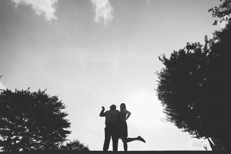Silhouette of couple kissing during their engagement session with Northern NJ wedding photographer Ben Lau.