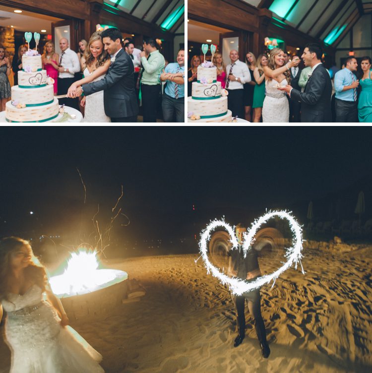 Cake cutting and sparklers at a wedding at the Lake Valhalla Club in Montville, NJ. Captured by NJ wedding photographer Ben Lau.