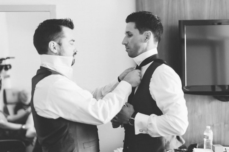 Groom gets ready for his wedding in Morristown, NJ. Captured by NJ wedding photographer Ben Lau.
