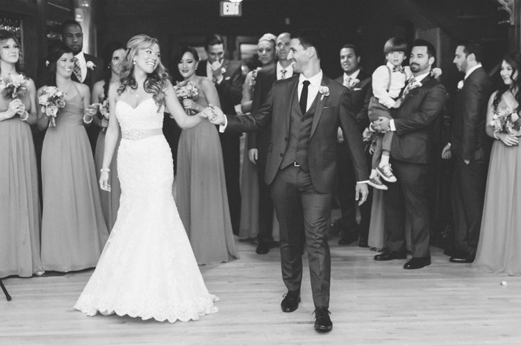 Bride and groom's first dance during a wedding reception at the Lake Valhalla Club in Montville, NJ. Captured by NJ wedding photographer Ben Lau.