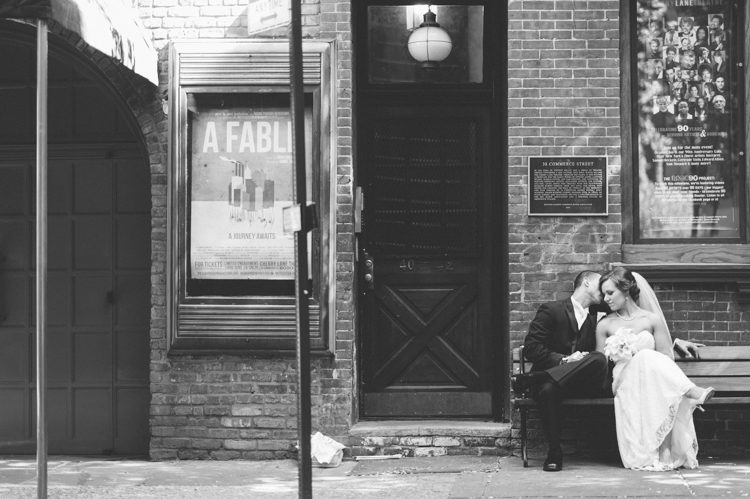 Bride and groom sit next to each other in the West Village. Captured by NYC wedding photographer Ben Lau.