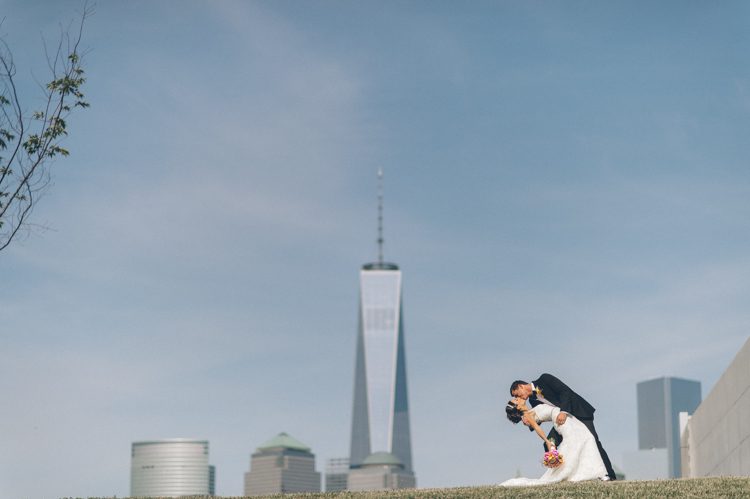 Bride and groom wedding photos at the Liberty House in Jersey City, NJ. Captured by awesome NJ wedding photographer Ben Lau.