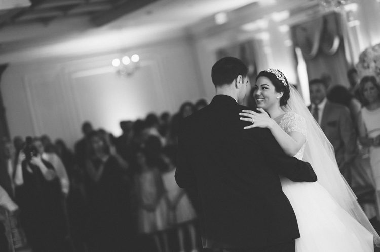 Bride and groom's first dance during a wedding at the Inn at New Hyde Park. Captured by NYC wedding photographer Ben Lau.