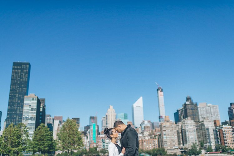 NYC engagement session on Roosevelt Island. Captured by NYC wedding photographer Ben Lau.