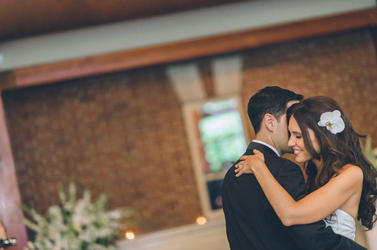 First dance during a wedding reception at the Central Park Boathouse. Captured by NYC wedding photographer Ben Lau.