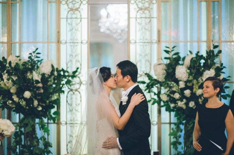 Wedding ceremony at the Lotos Club in NYC. Captured by NYC wedding photographer Ben Lau Photography.