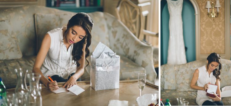 Bride opens her gift on the morning of her wedding at Oheka Castle in Long Island, NY. Captured by NYC wedding photographer Ben Lau.