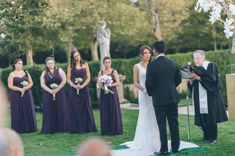 Wedding ceremony at Oheka Castle in Long Island, NY. Captured by NYC wedding photographer Ben Lau.