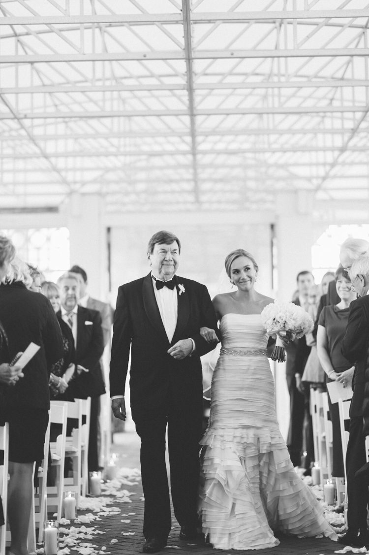 Wedding ceremony during a Mallard Island Yacht Club wedding. Captured by NJ wedding photographer Ben Lau.