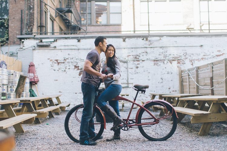 Jen & Jeff's NYC engagement session at a bar. Captured by NYC wedding photographer Ben Lau.