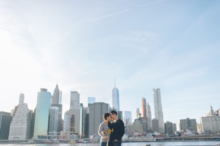 Jen & Jeff's NYC engagement session at Brooklyn Bridge Park. Captured by NYC wedding photographer Ben Lau.