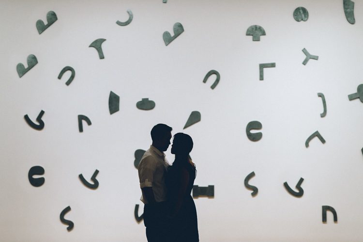 Jen & Jeff's NYC engagement session at MoMA. Captured by NYC wedding photographer Ben Lau.
