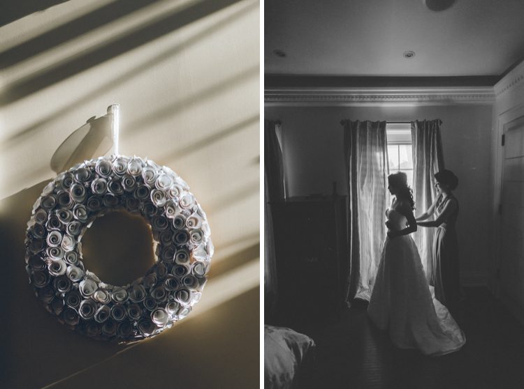 Bride slips into her gown on the morning of her wedding at the Venetian in Garfield, NJ. Captured by NJ wedding photographer Ben Lau.