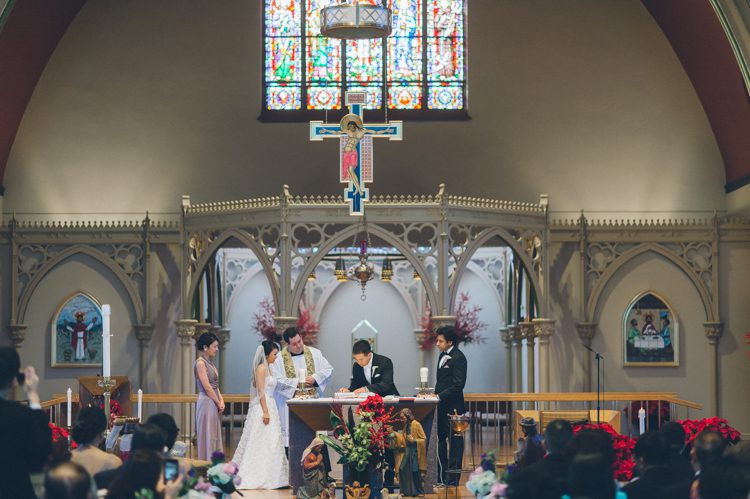 Wedding Ceremony at St. Luke Church in Whitestone, NY. Captured by NJ wedding photographer Ben Lau.