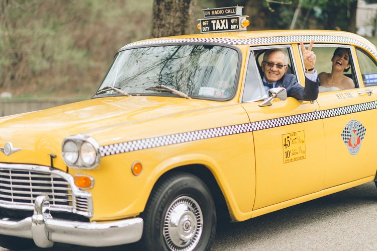 Father of the bride drives a vintage taxi on the morning of his daughter's wedding at Mayfair Farms wedding in West Orange, NJ, captured by Northern NJ wedding photographer Ben Lau.