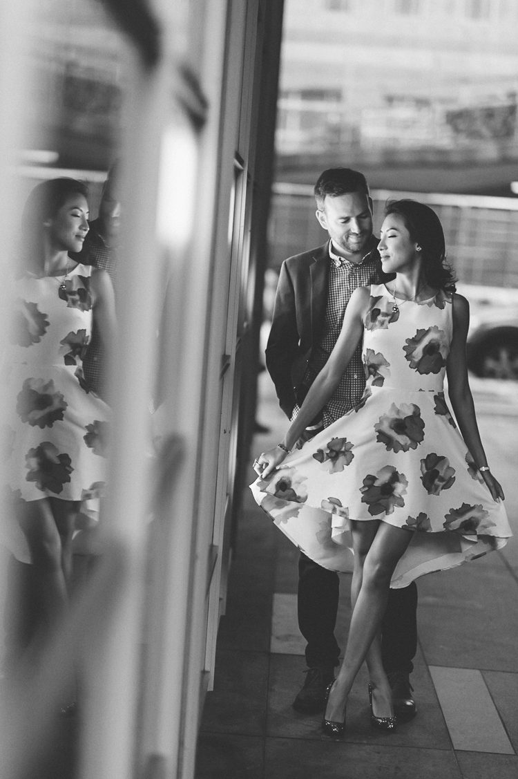 Rainy Battery Park engagement session in NYC, captured by fun NYC wedding photographer Ben Lau.