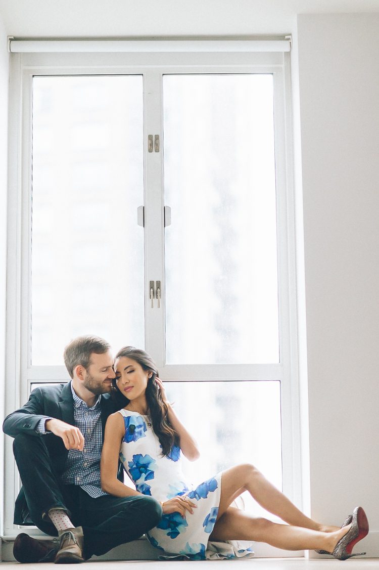Rainy Battery Park engagement session in NYC, captured by fun NYC wedding photographer Ben Lau.