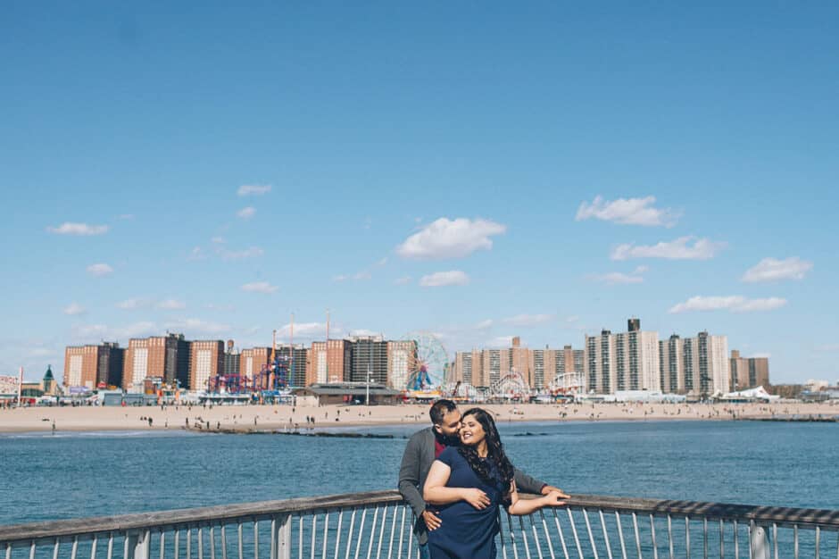 Coney Island engagement session in Brooklyn, NY - captured by photojournalistic NYC wedding photographer Ben Lau.