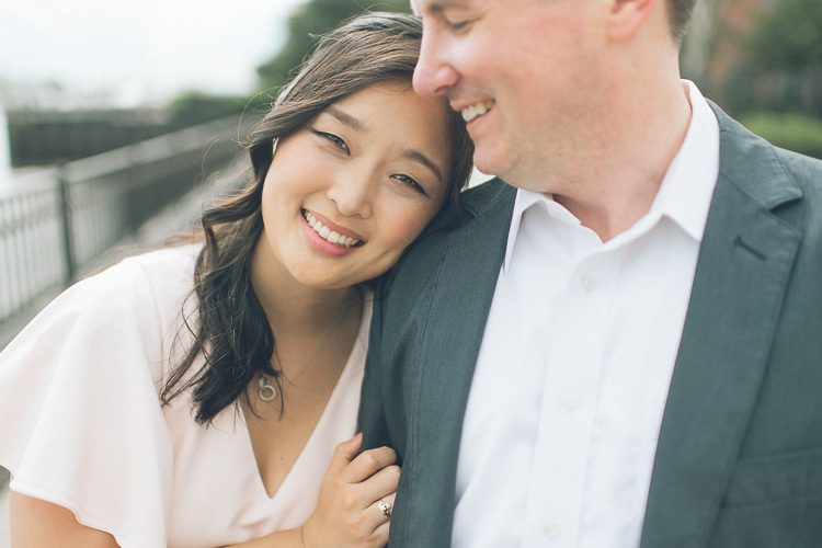 Fun Jersey City engagement session with the NYC skyline, captured by North Jersey wedding photographer Ben Lau.