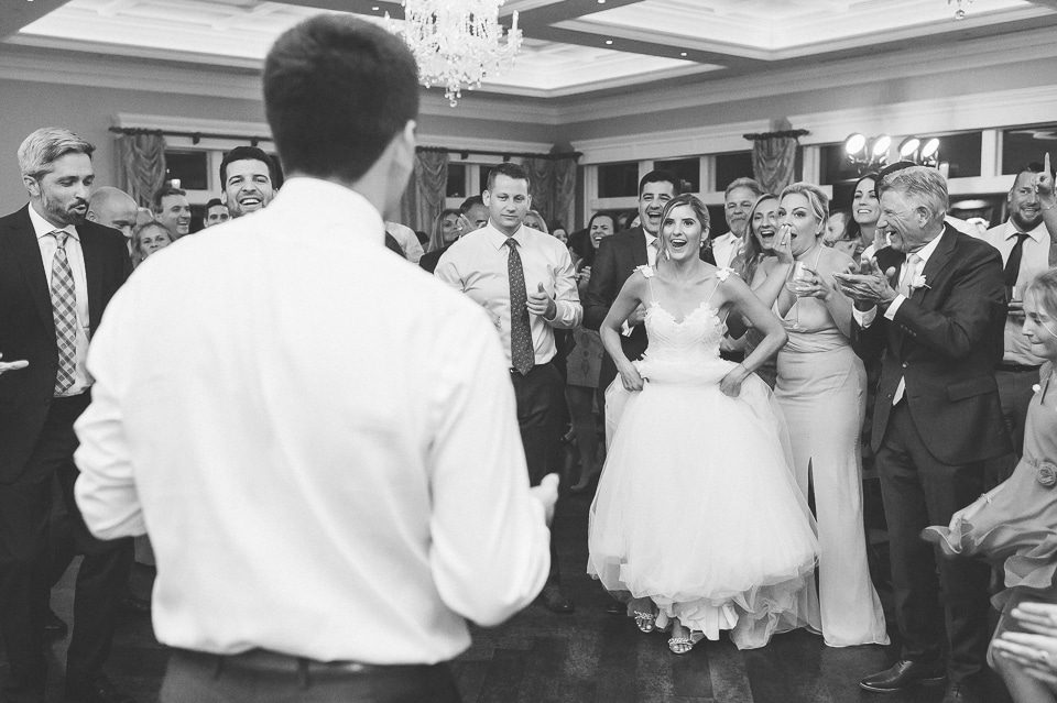 Clarks Landing Yacht Club wedding in Point Pleasant, captured by candid, photojournalistic NJ wedding photographer Ben Lau.